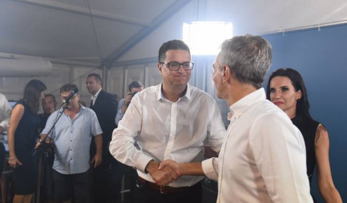 Simon Busuttil (right) congratulated Delia on his victory