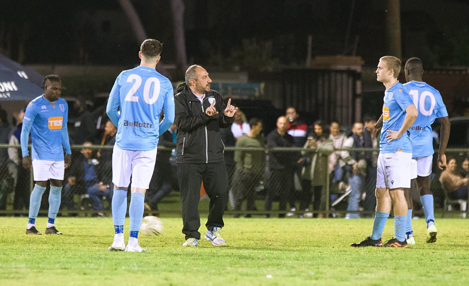 Ramon Falzon on the pitch in Australia giving his players instructions