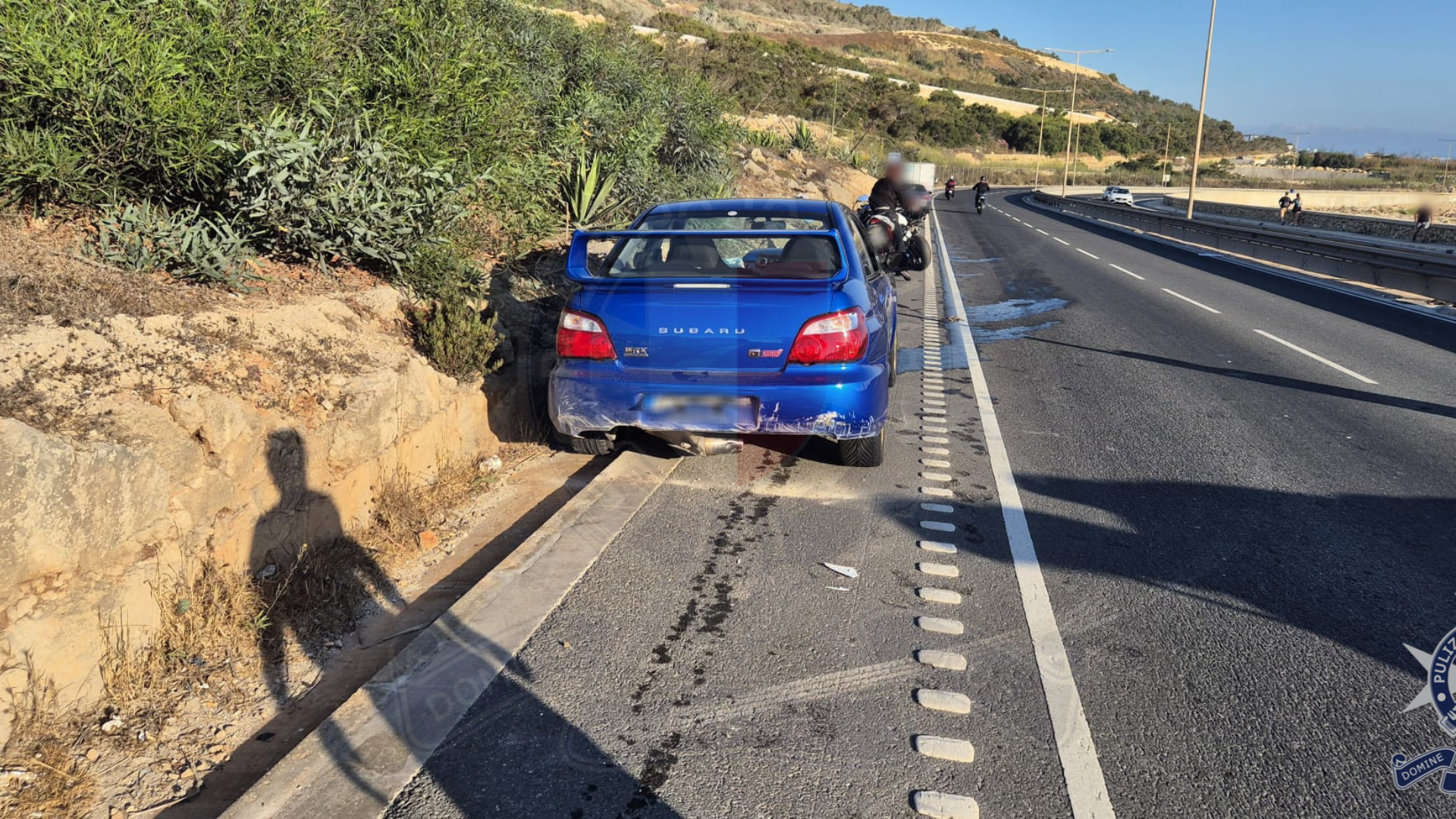 The collisions began after a Subaru hit a wall and came to a stop across both lanes (Photo: Police)