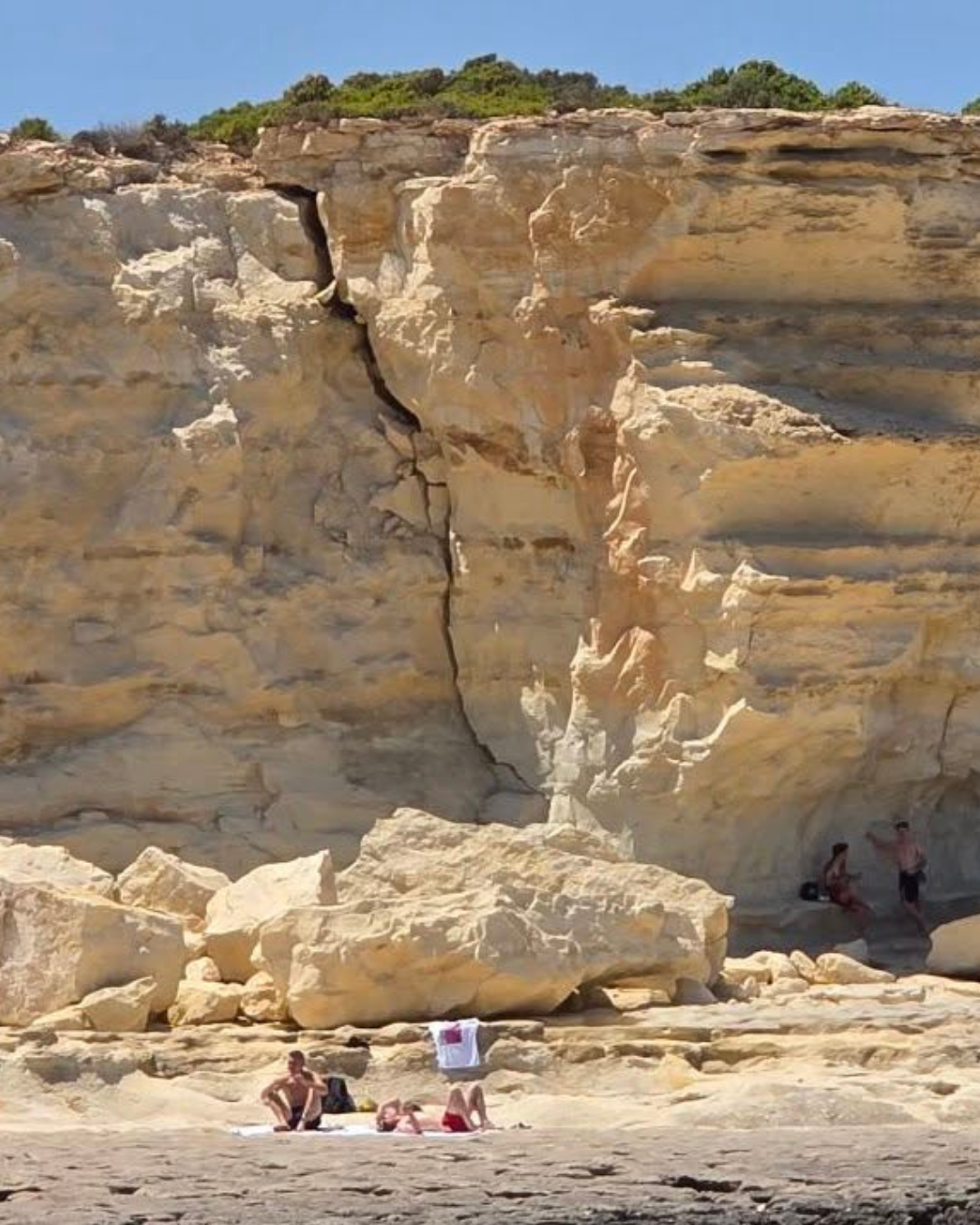 A deep crack runs down the cliff face at St Peter's Pool, photographs show, as a huge slab of rock hangs over a stretch of shore used by swimmers and sunbathers. (Photo: Charles Falzon)