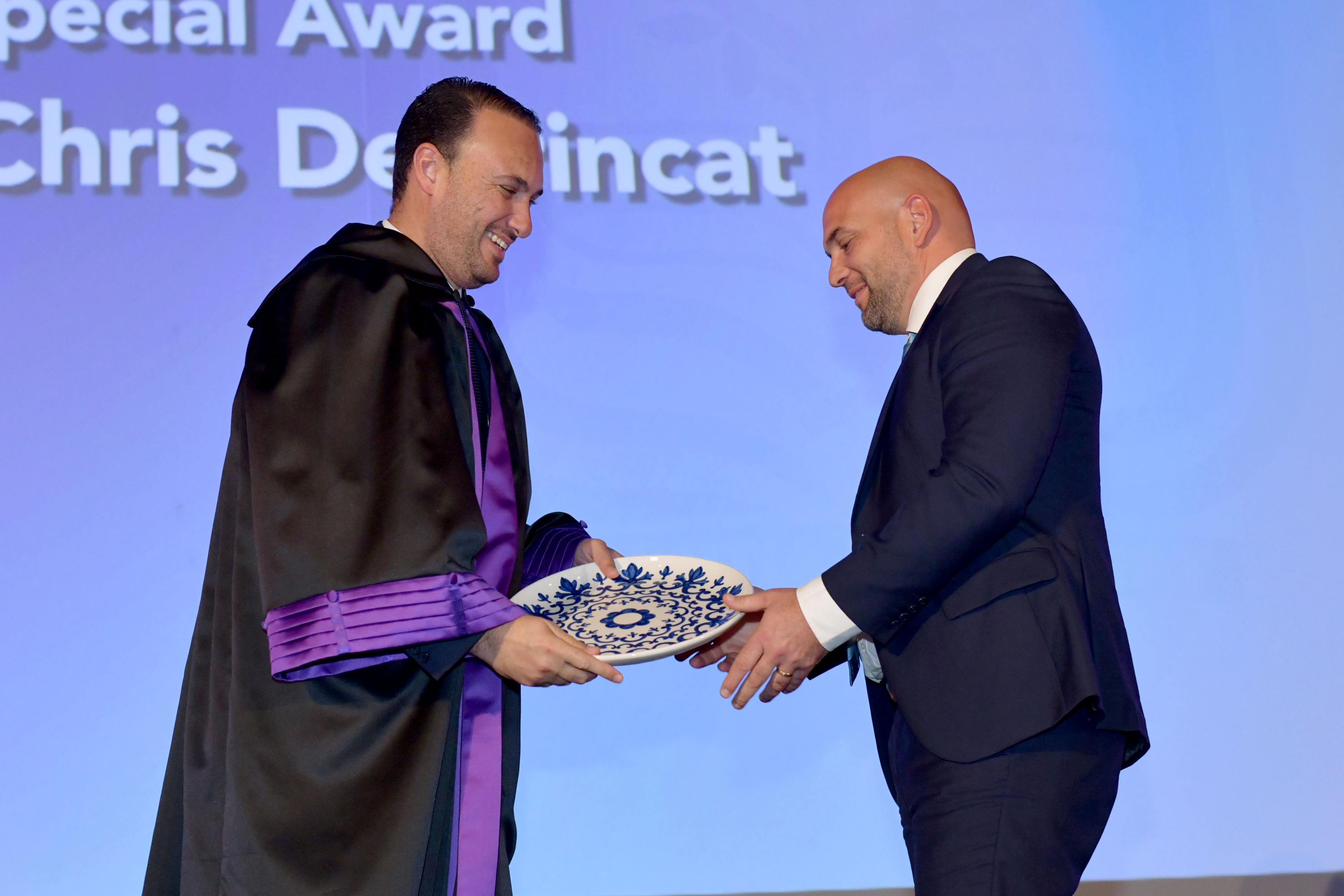 Christopher DeBrincat receiving the award 