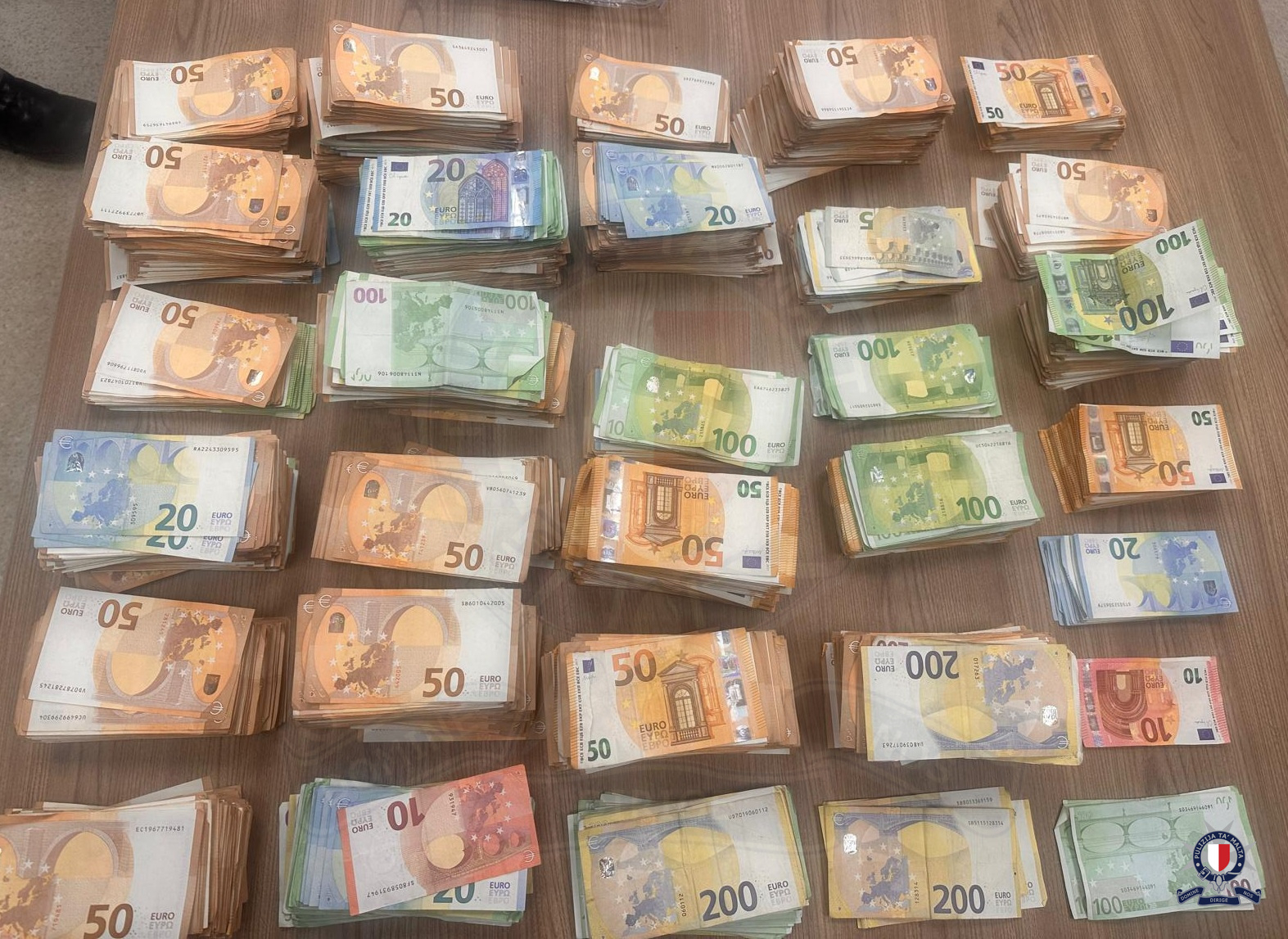 Over €387,000 in cash was seized during the operation (Photo: Malta Police)