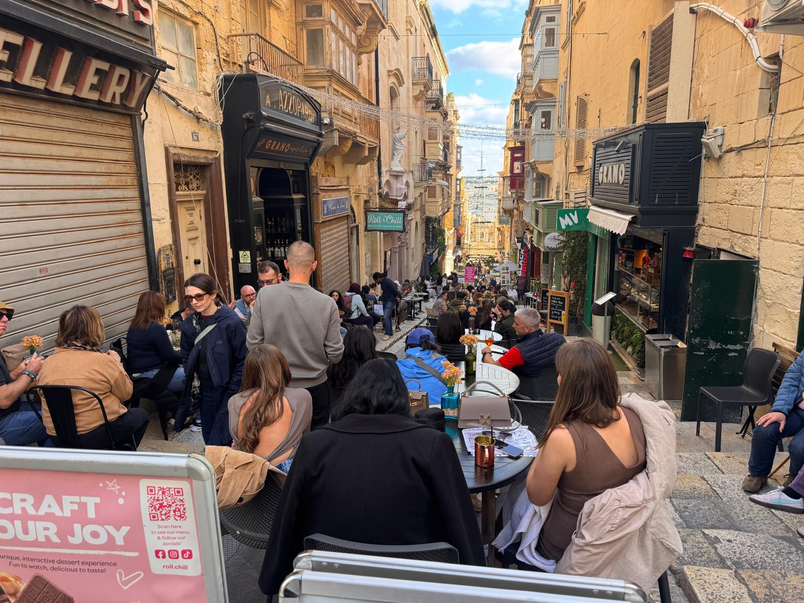 Merchants Street in Valletta, now a sea of tables and chairs for not very discerning tourists