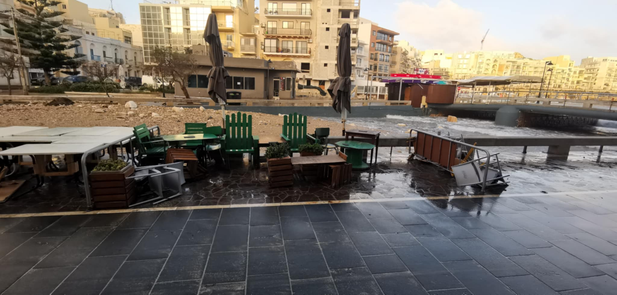 Outdoor furniture from other shops in the area were sprawled across the street, carried away by the sea and wind (Photo: John Aldhouse)