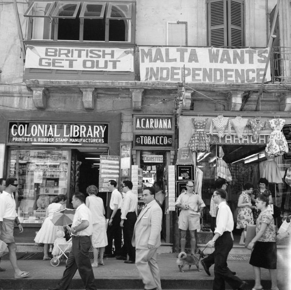 Valletta shops covered in pro-independence signs sometime around 1964 (Photo: Marine Photo Service)
