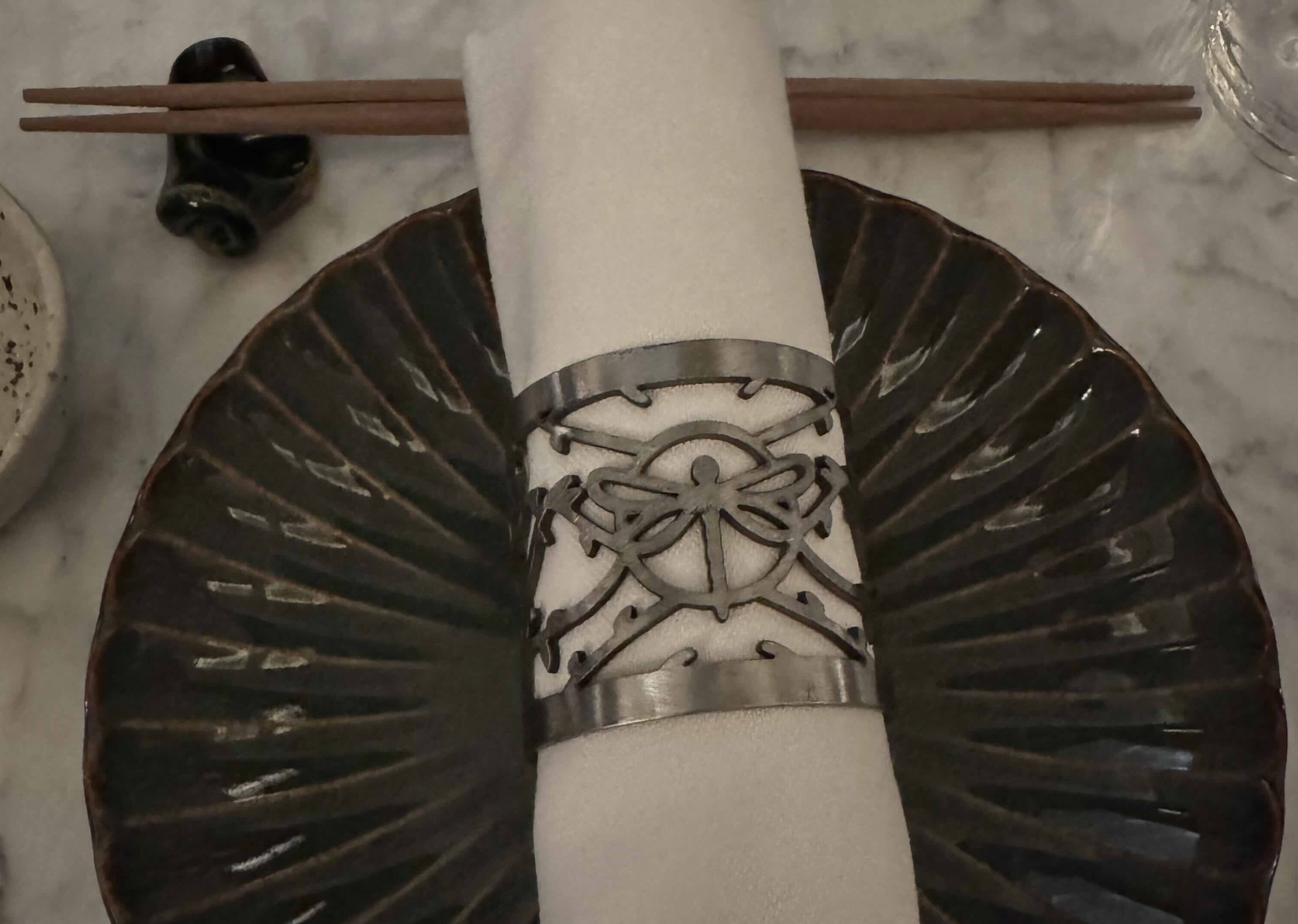 Aki's signature emblem, the dragonfly