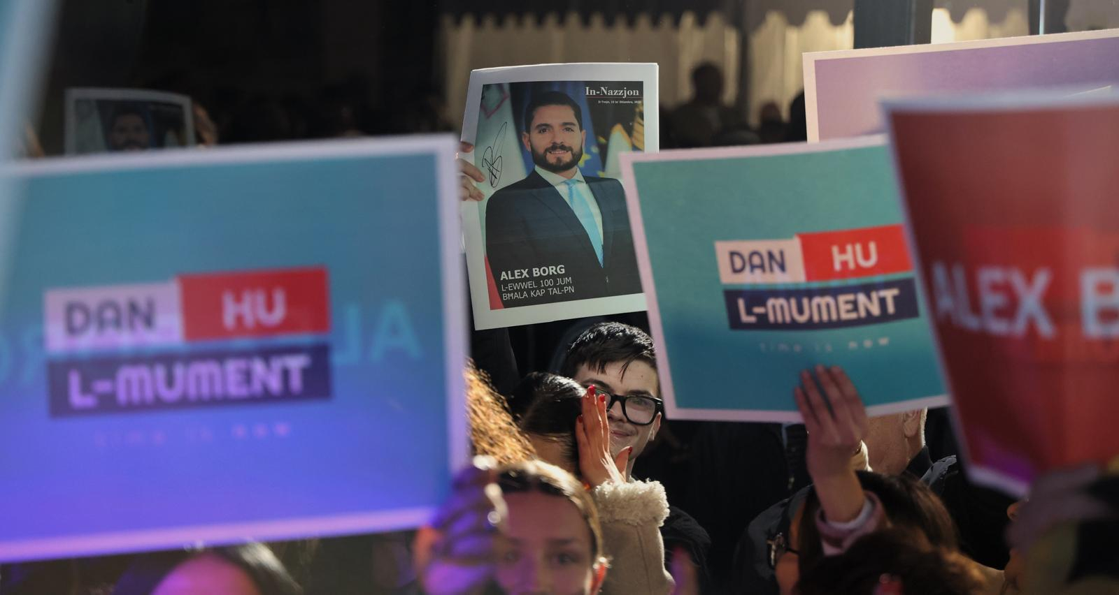 PN supporters holding posters with Alex Borg's campaign slogan, Dan hu l-Mument (Photo: PN)