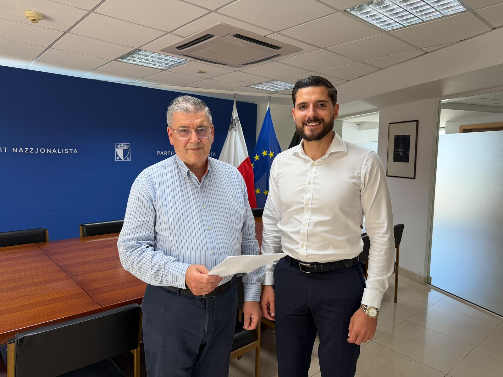 Alex Borg with Chairperson of the Electoral, Records and Data Commission of the PN Mario Callus 