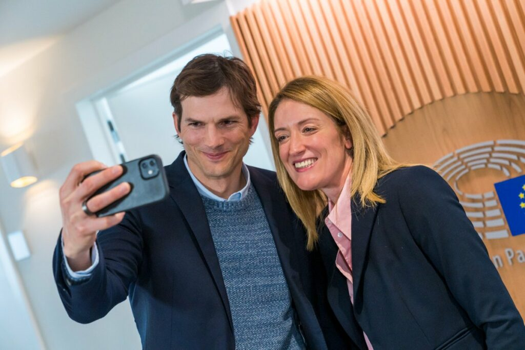 Ashton Kutcher seen here posing for a photo with EP President Roberta Metsola in 2023 as he lobbied MEPs on child abuse monitoring software that would scan and report images sent over encrypted messaging tools like WhatsApp