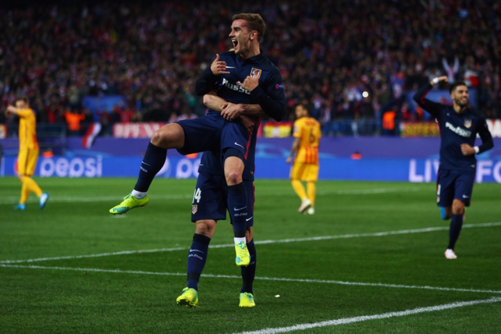 Antoine Griezmann of Atletico celebrates his team's first goal