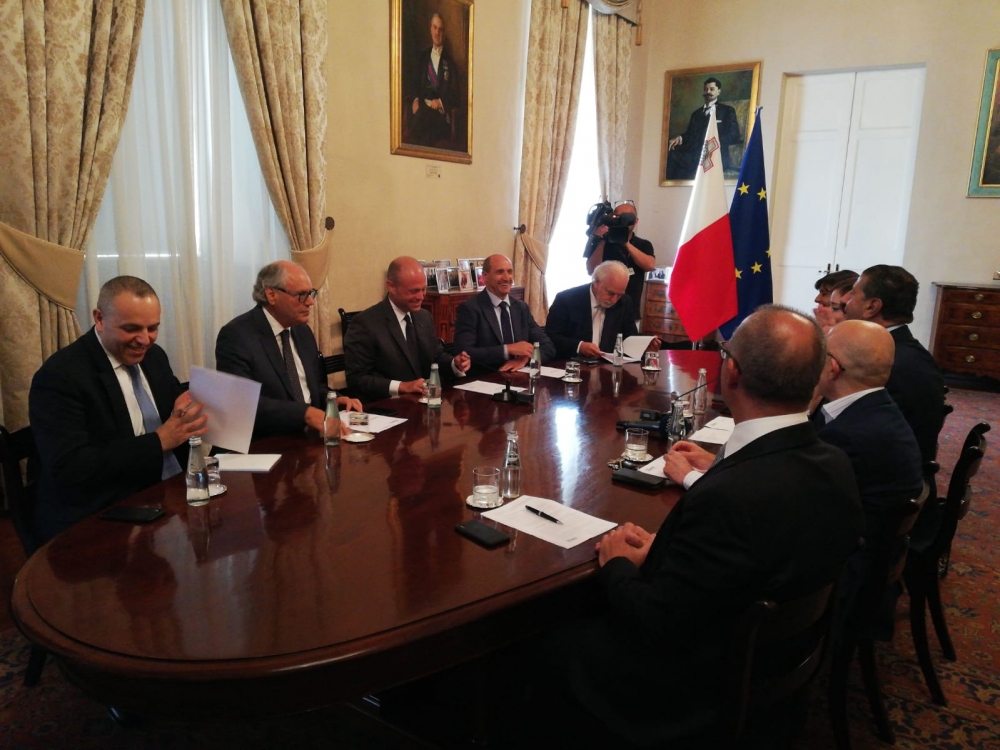 Prime Minister Jospeh Muscat receiving budget proposals from the GRTU in a meeting at the Auberge de Castille