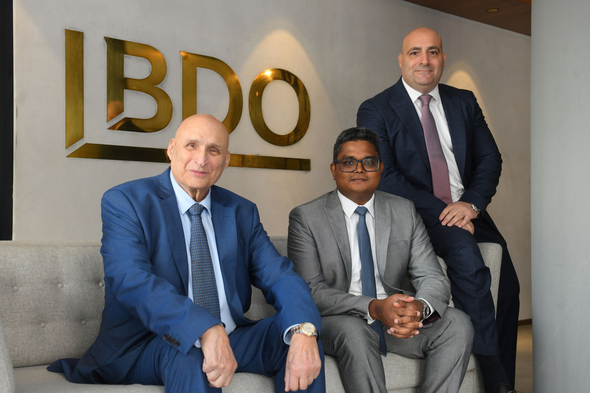 Sitting: Mr John Attard, Senior Managing Partner of BDO Malta on the left, Mr Dhayalaruban Thangaraja, Director of Internal Audit in the middle, and Mr Mark Attard, Partner & CEO of BDO Malta on the right