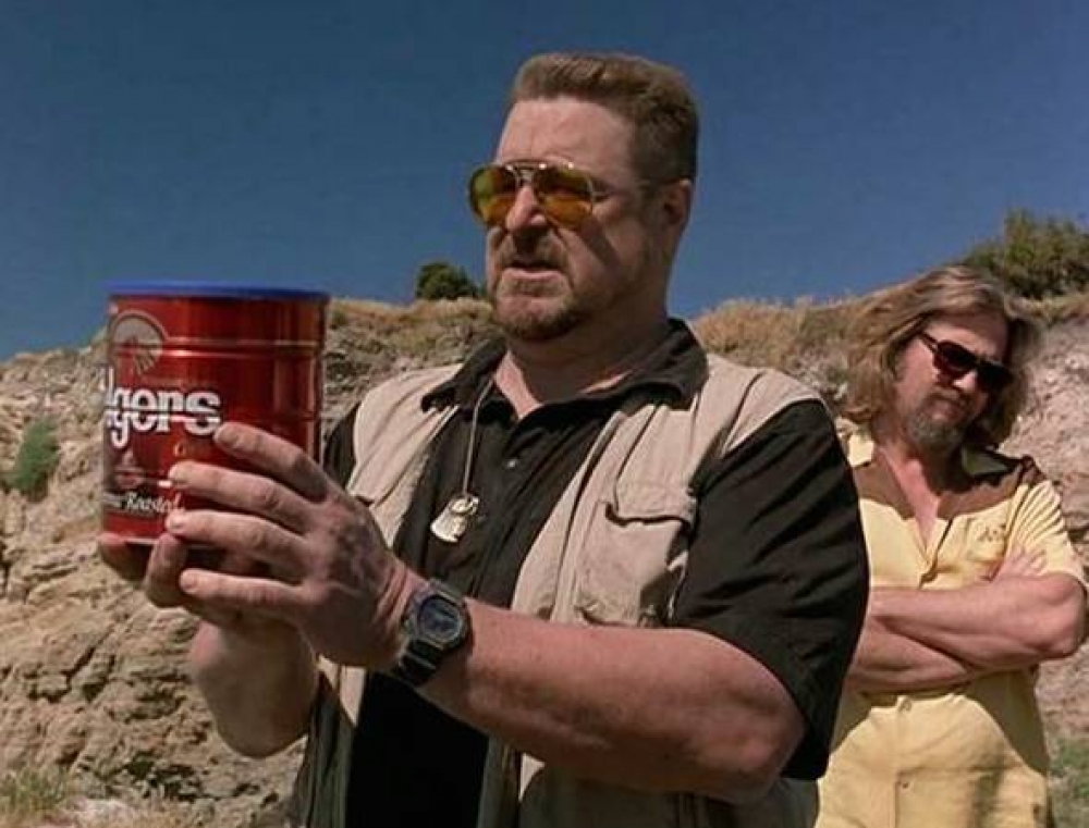 The Big Lebowski (1998) - Donny's ashes are scattered out in the wind, only to be blown back into Jeff Bridges's face (background)