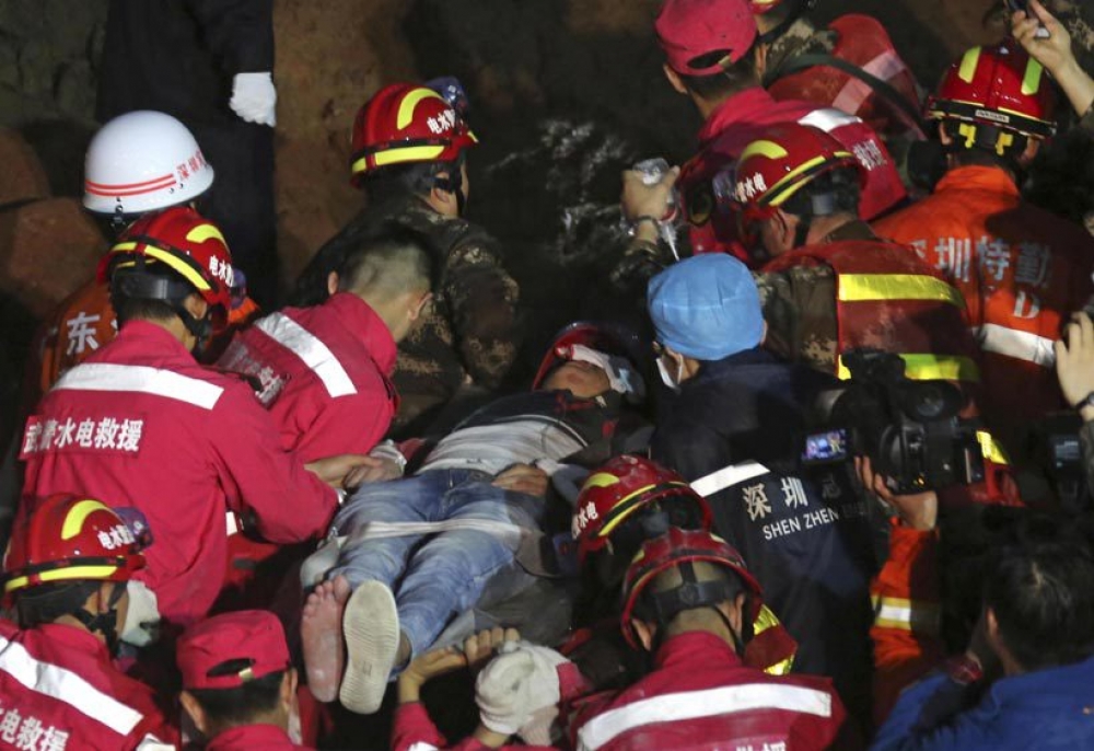 A man was found alive in the rubble, 67 hours after the landslide in Shenzhen in China