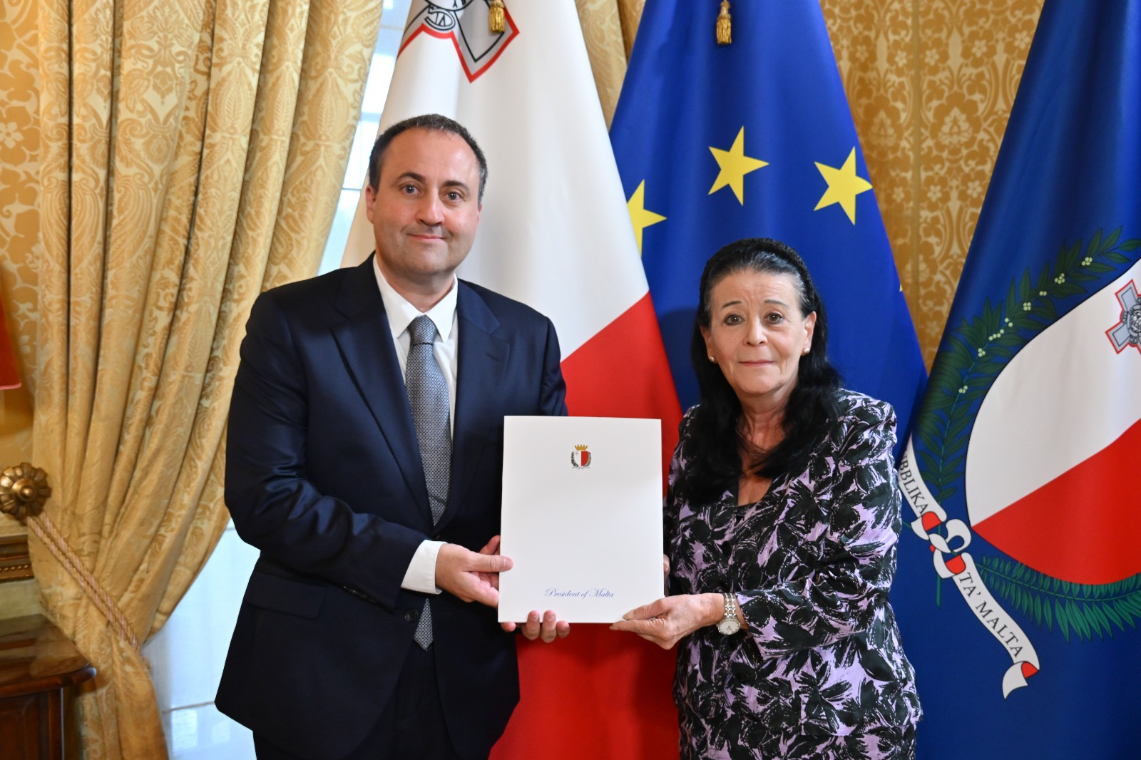 David Muscat (left) receiving his letters of appointment from President Myriam Spiteri Debono (Photo: DOI)