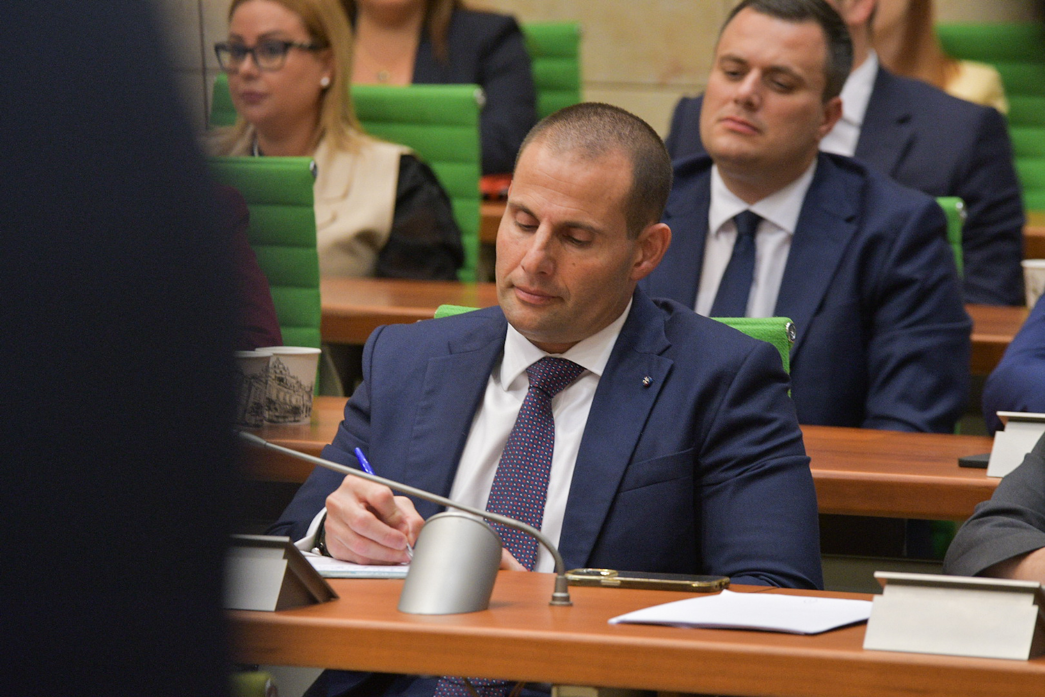 Prime Minister Robert Abela takes notes as Borg delivers his speech (Photo: James Bianchi/MaltaToday)