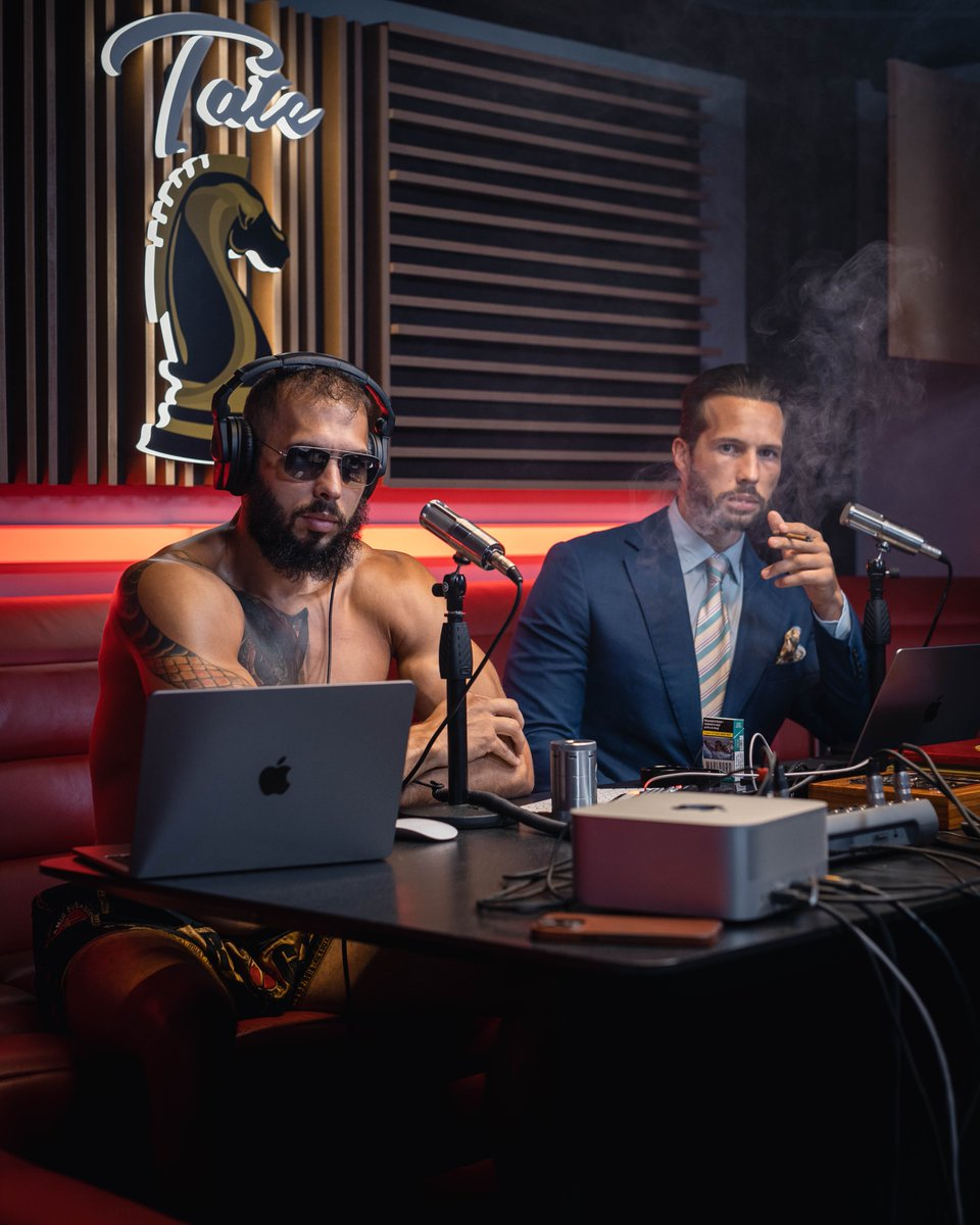 Andrew Tate (left) shirtless and his brother Tristan (right) scowl at the camera 