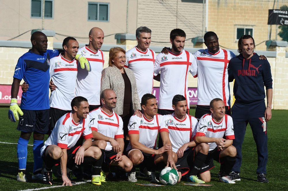 President with Minister Carmelo Abela and the inmates before kick-off (Photo Ray Attard)