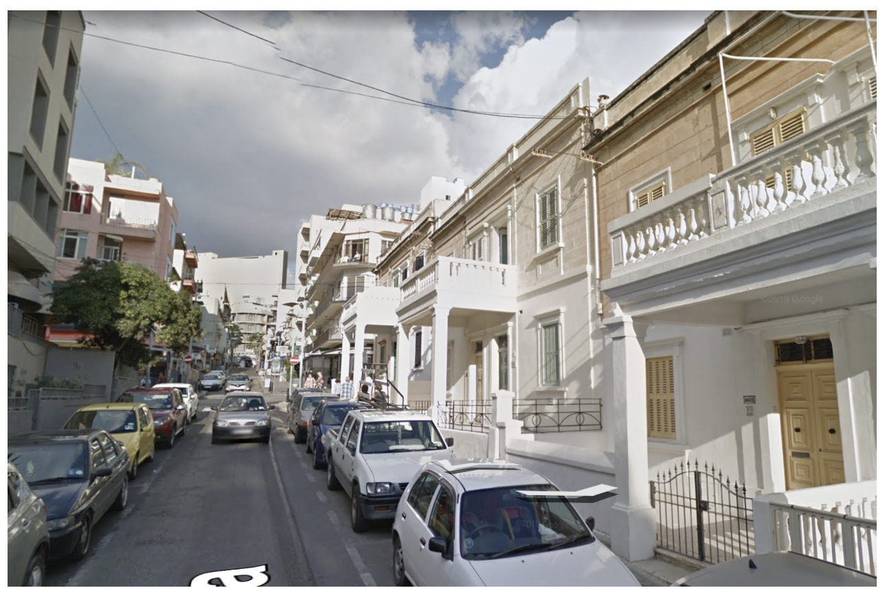 The row of Paceville townhouses