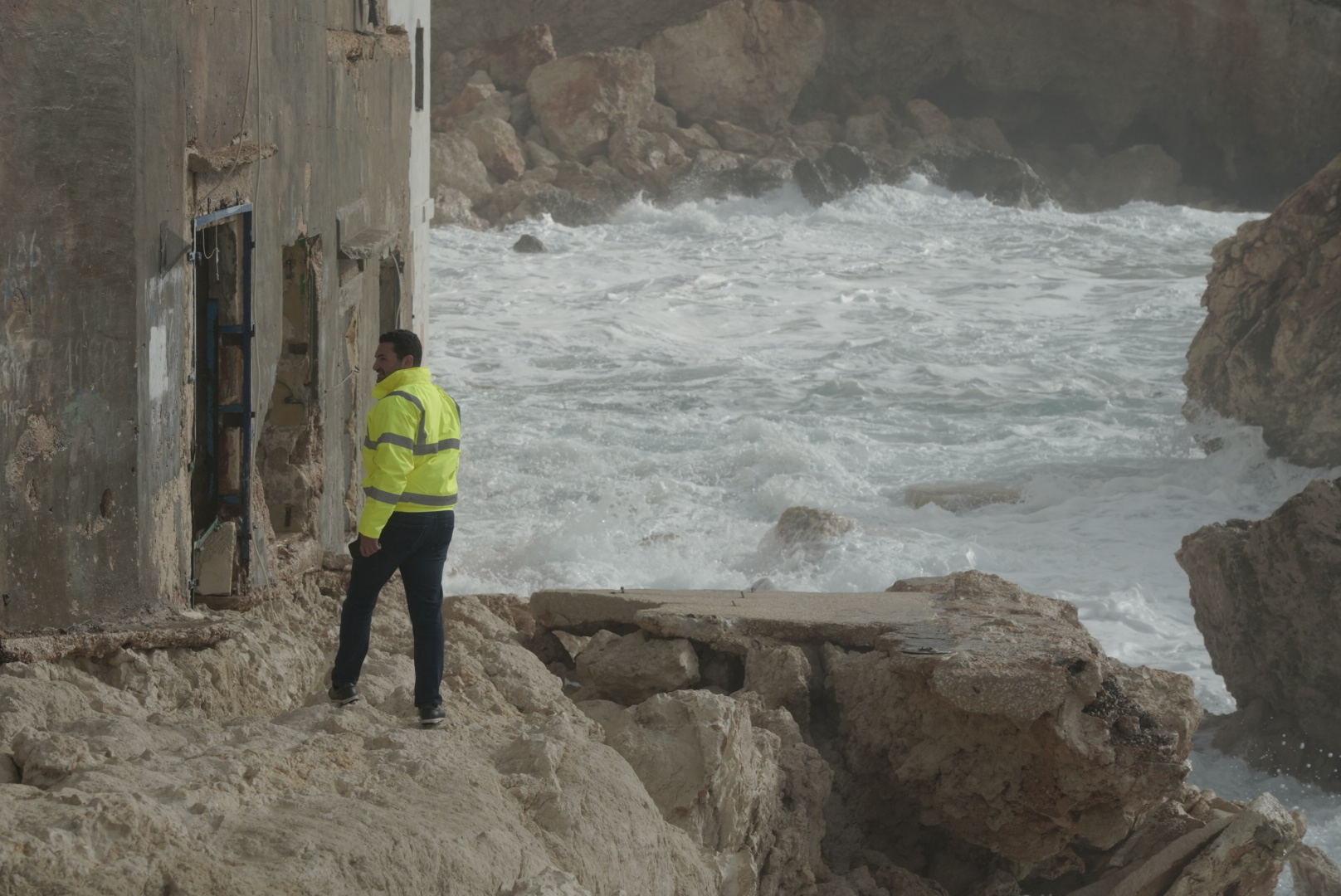 Public works parliamentary secretary Omar Farrugia assess the damage (Photo: James Bianchi/MaltaToday)