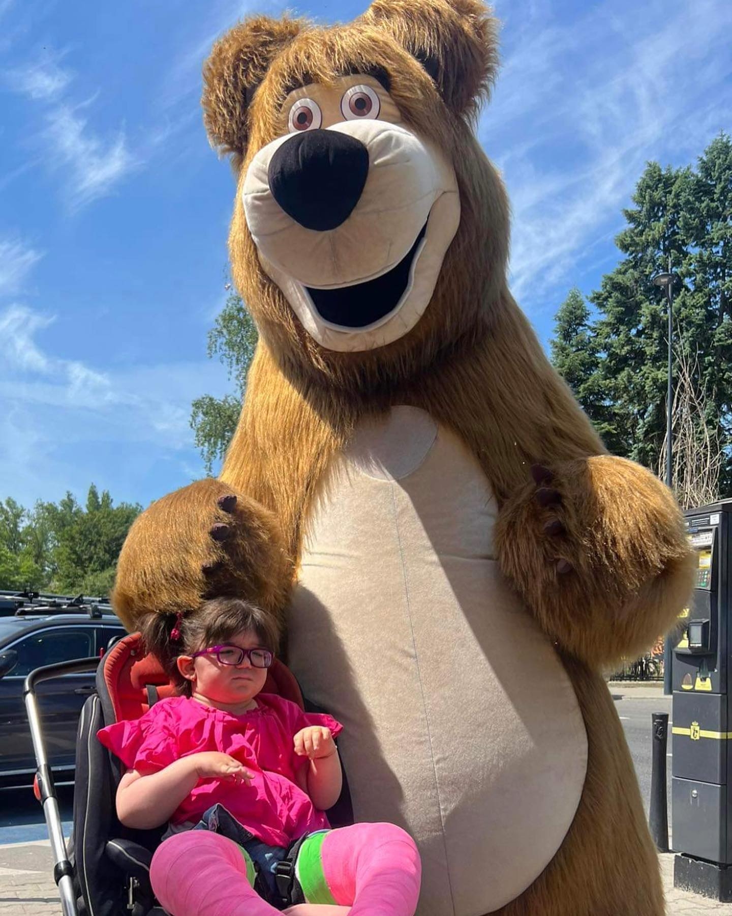 Kate Ferriggi with her favourite cartoon character from Masha and the bear