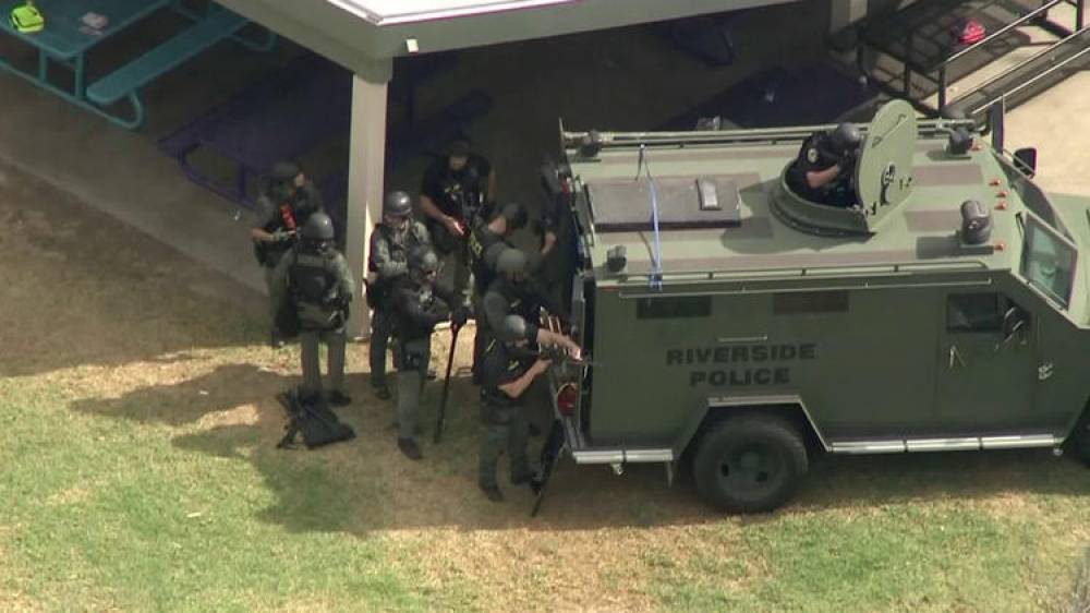 California parent who held elementary school teacher hostage shot dead, say police