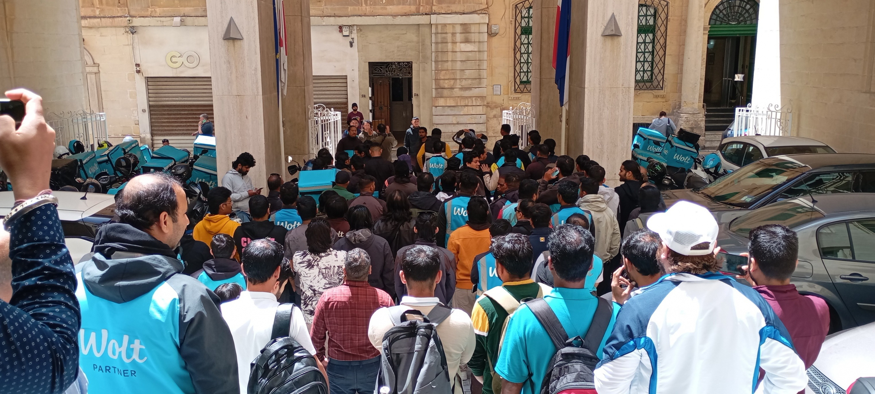 A photo supplied by the General Workers' Union after food couriers were threatened not to become union members (Photo: GWU)