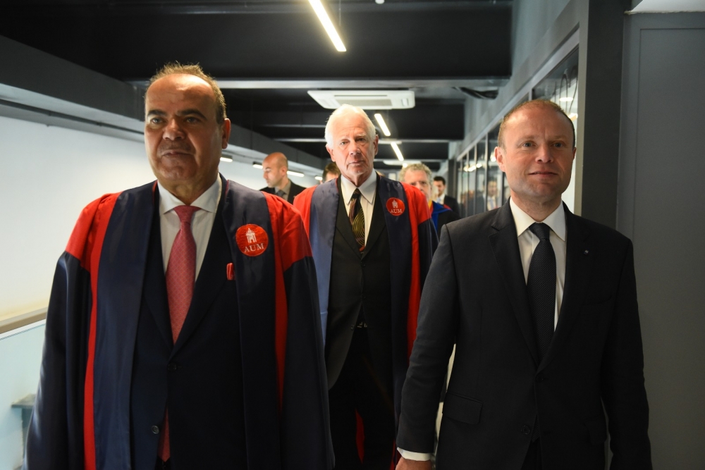 Prime Minister Joseph Muscat was given a tour of AUM's Bormla campus by the owner of Sadeen Education, Hani Salah (left)