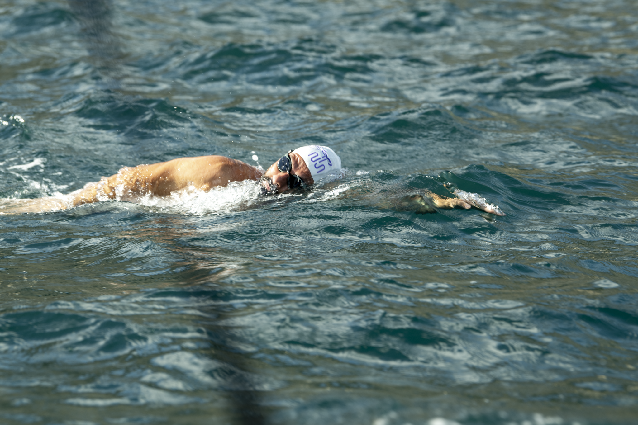 Neil Agius recreates historic Toni Bajada swim and donates cap
