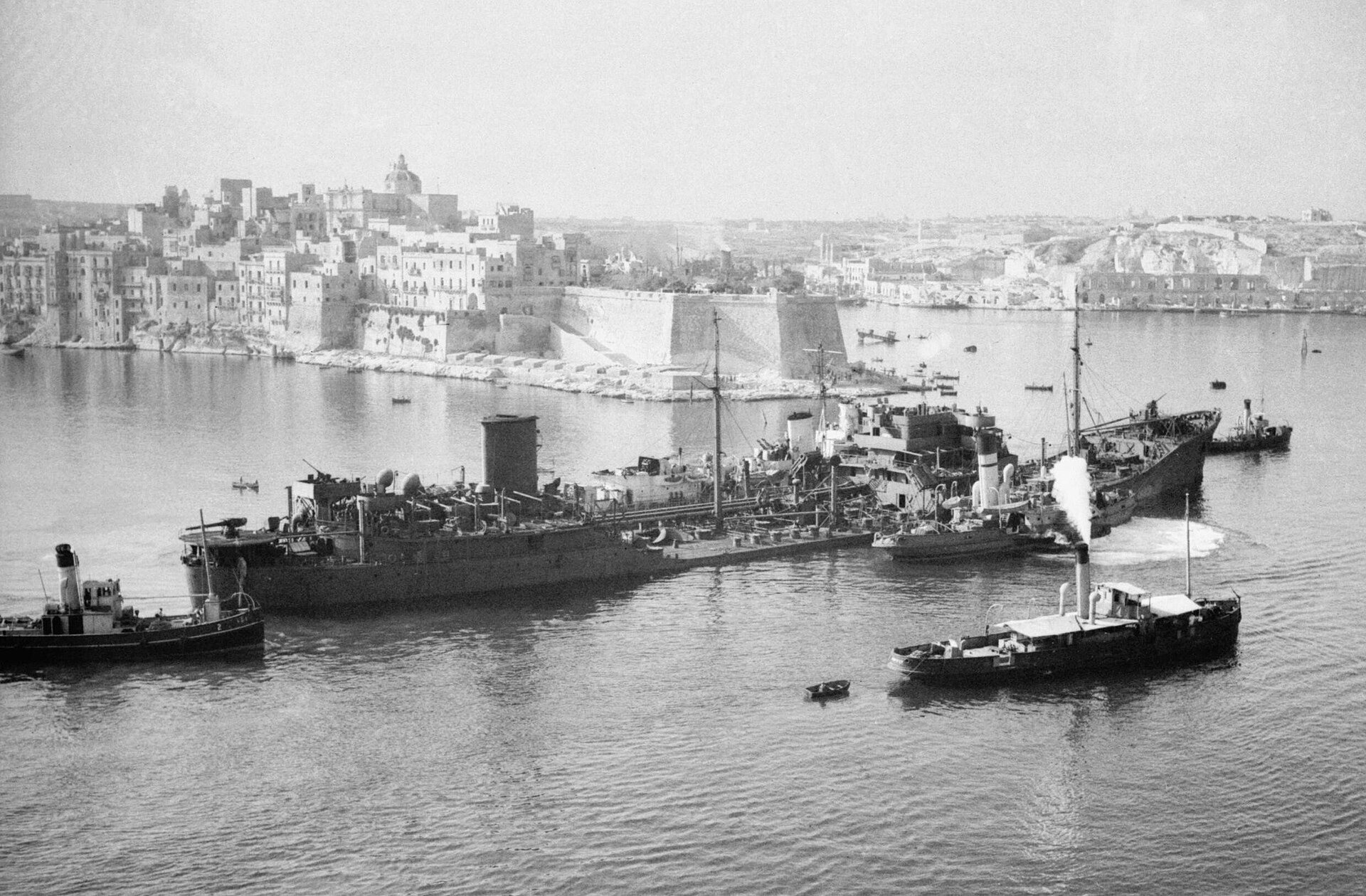 The SS Ohio arrived at the Grand Harbour with a failed engine and its deck so close to the water that it was at risk of splitting in half (War Office official photographer, Cook H E Lt)
