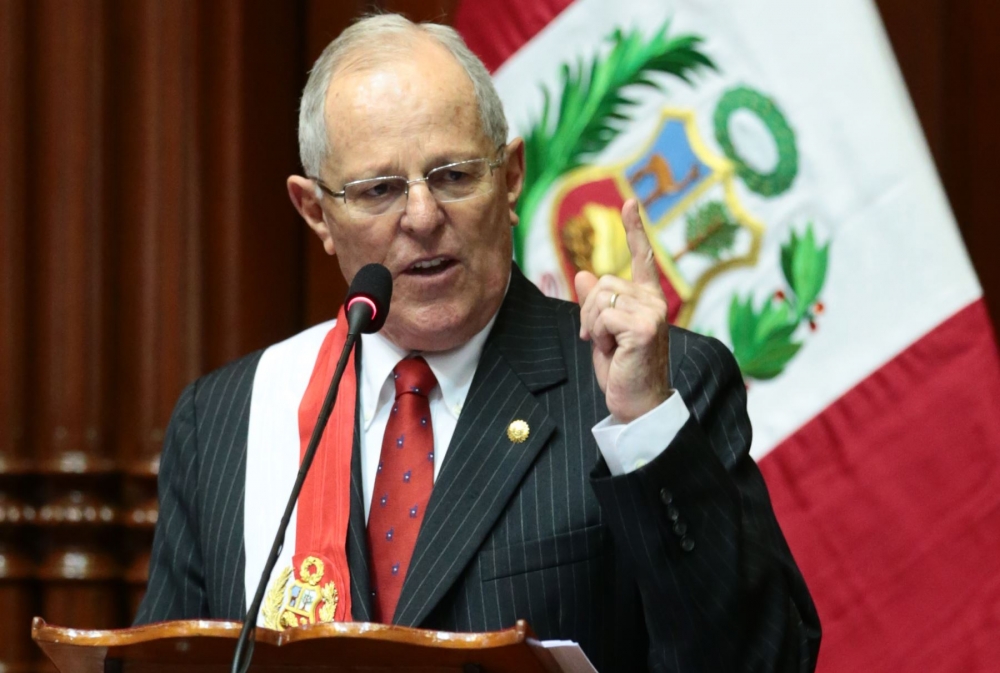 Former banker sworn in as Peru's new president