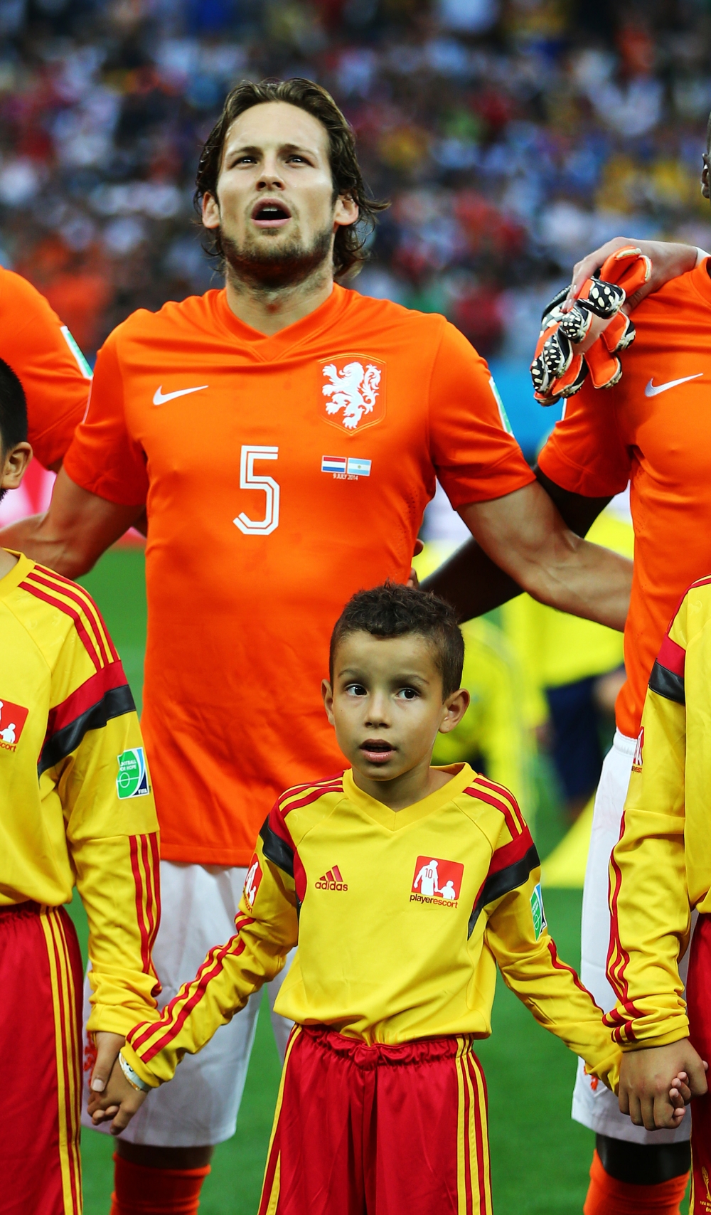 Young McDonald’s Player Escort accompanies Daley Blind at World Cup Semi-final