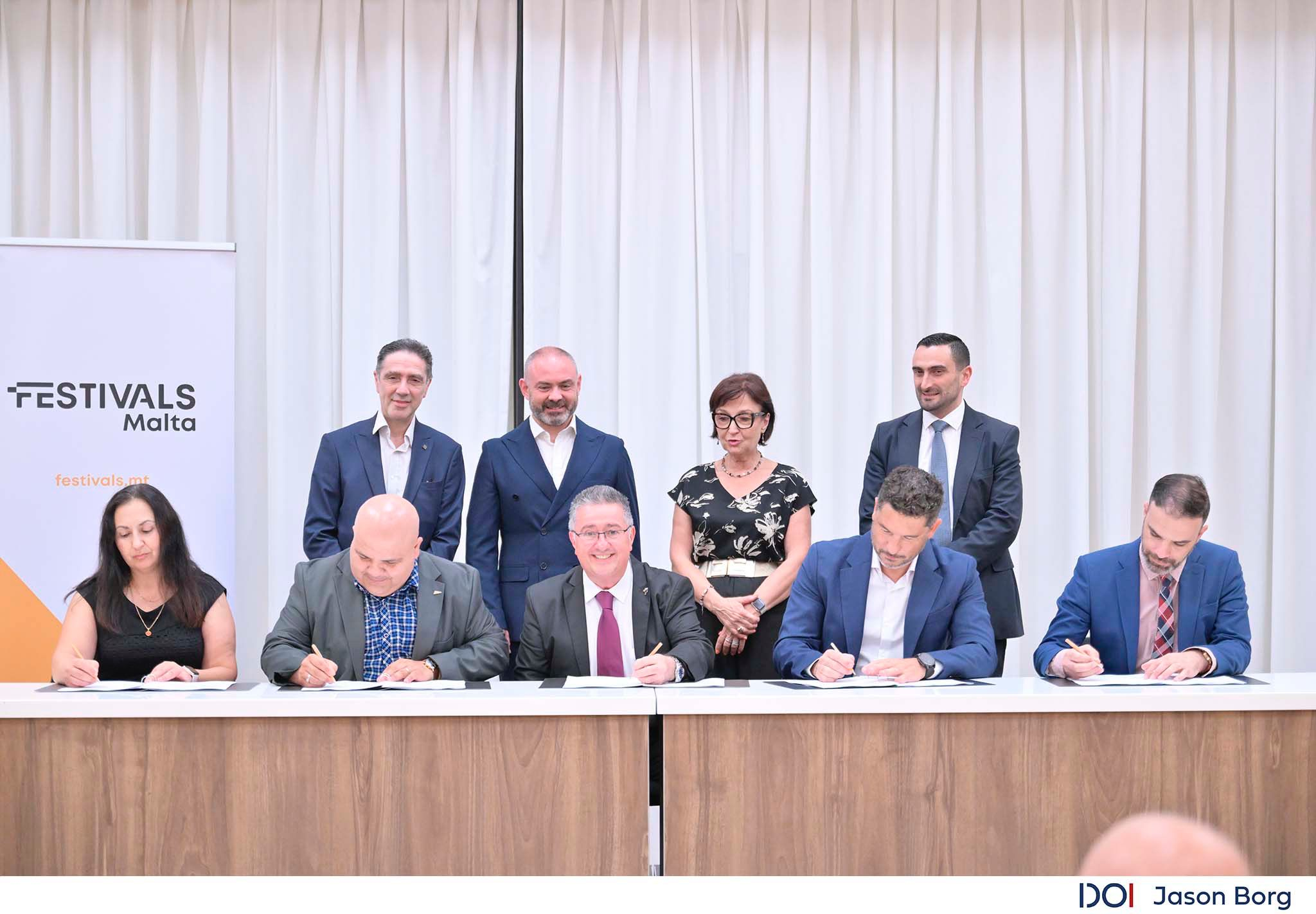Officials signing the collective agreement on Friday 