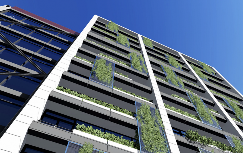 References to the green wall on the façade were mentioned in case officer reports for both the original project approved in 2015, and the additional storeys approved two years later and was also depicted in publicity videos