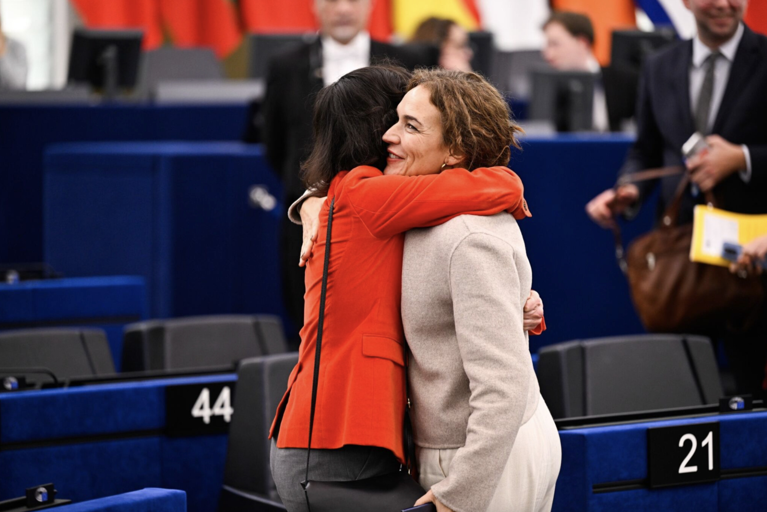 Spanish S&D MEP Lina Galvez (right) embracing European Commissioner Hadja Lahbib in the European Parliament after a non-binding resolution to facilitate access to abortion was approved. (Photo: Laurie Dieffembacq/EP)