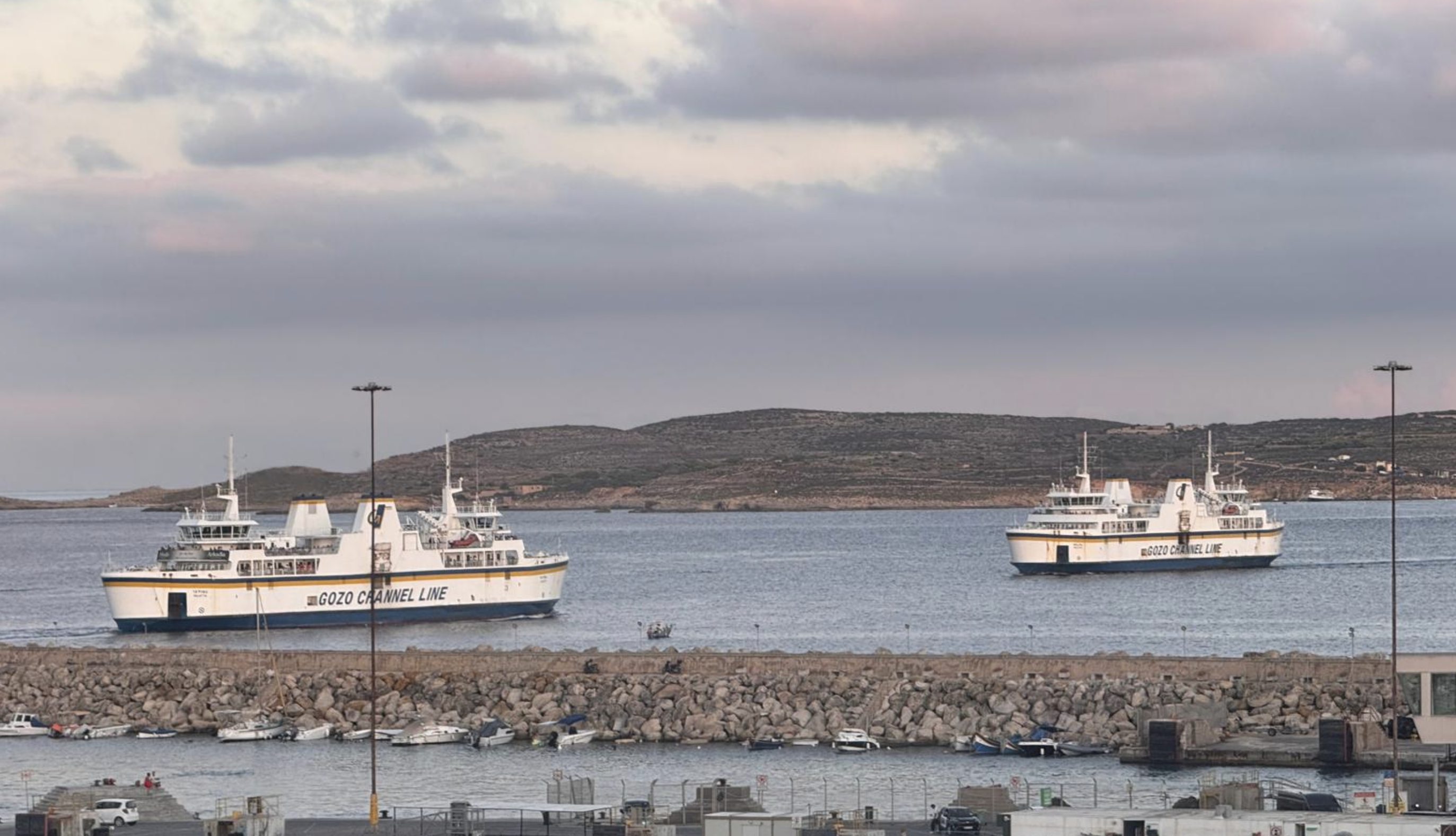 The plan proposes dynamic pricing for vehicles carried on ferries through Mġarr Harbour, specifically targeting non-resident tourist cars during peak periods