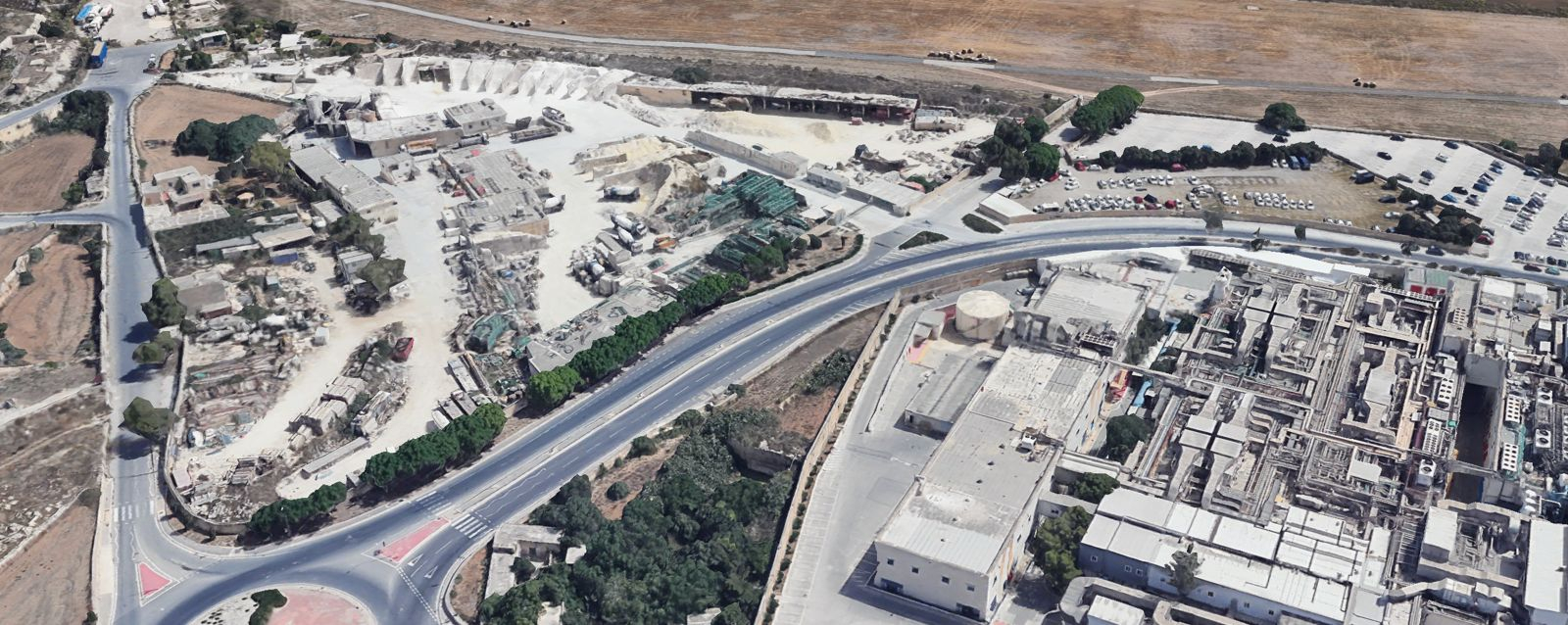 The existing Elbros yard (triangular plot) and the ST complex bottom-right
