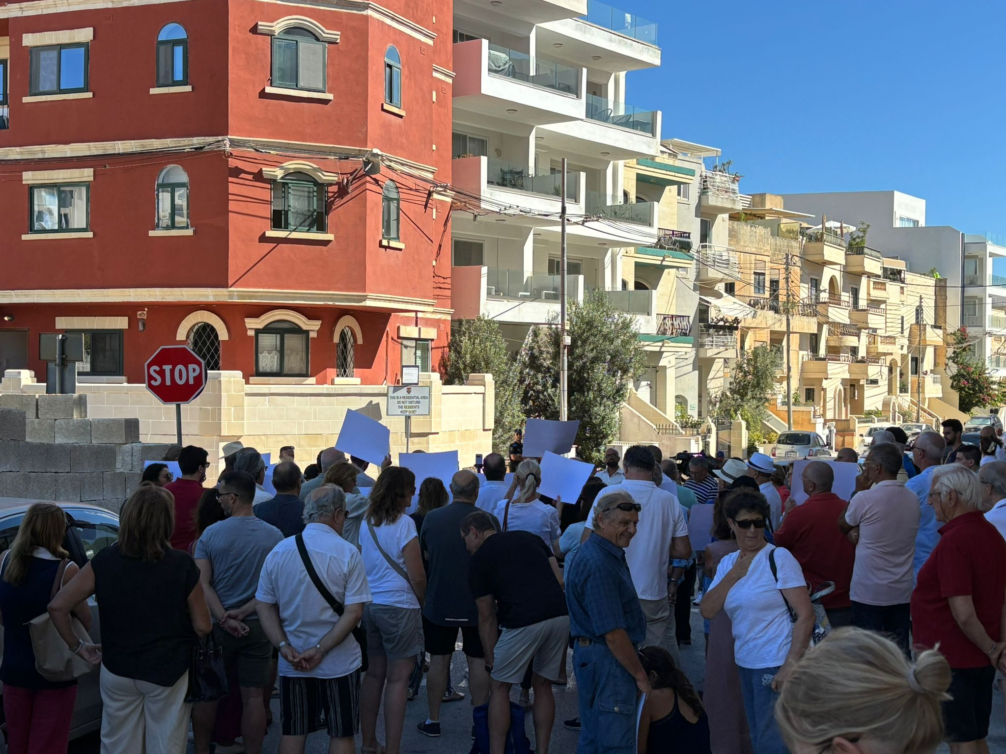 A protest in Swieqi in the summer of 2025 organised by Momentum saw residents air their grievances over anti-social behaviour by tourists and owners of short-let apartments (Photo: Momentum)