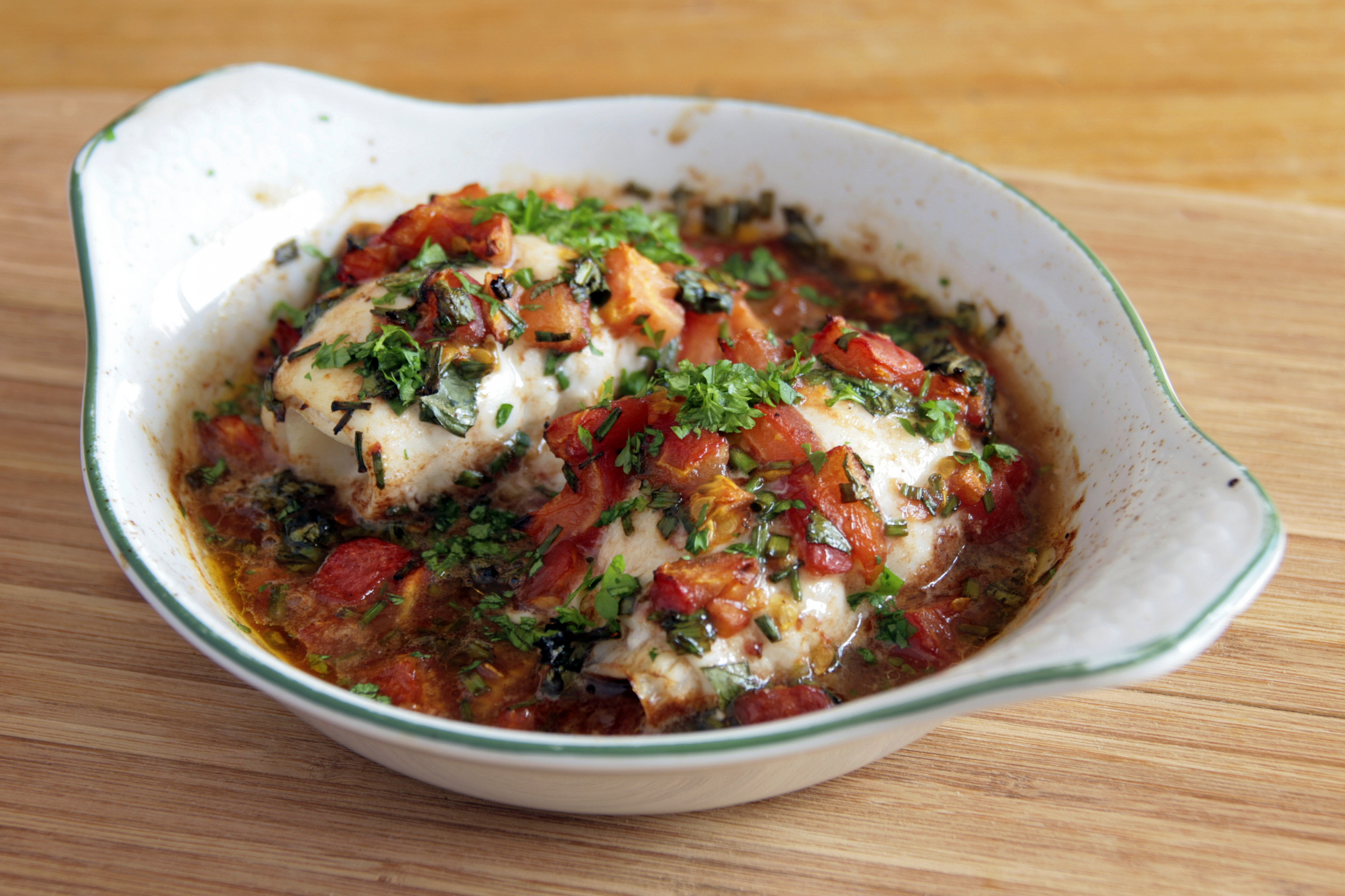 Lemon and herb swordfish with tomatoes and mushrooms