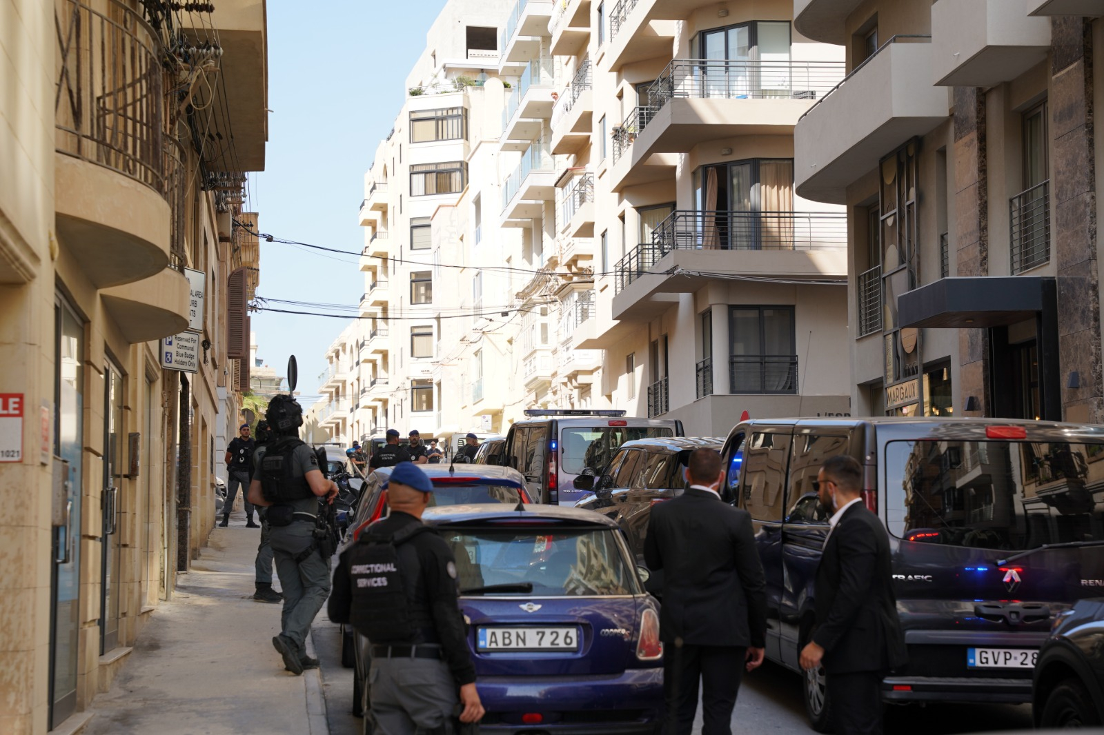 Police vans and prison guards were on site during the jury visit to the Sliema crime scene (Photo: Juliana Zammit/MaltaToday)