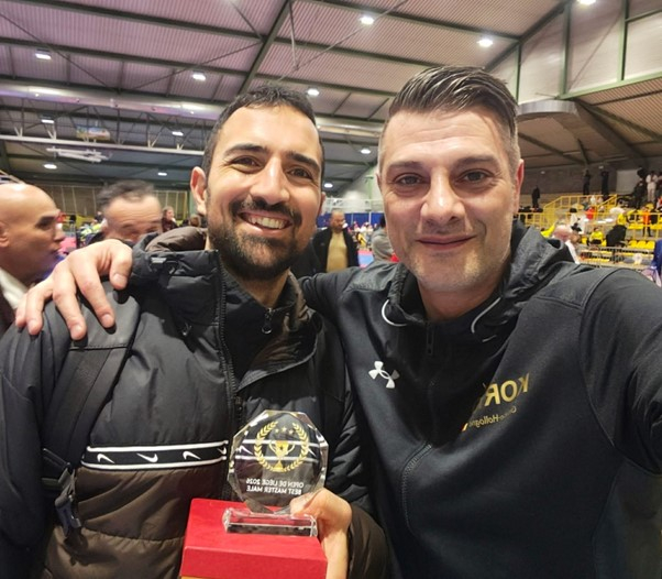 Winning the ‘Best Master Athlete’ award in the Open De Liege, presented by competition organiser Fabio De Simone