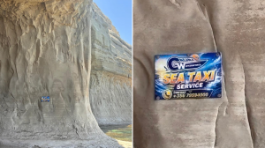 Sea taxi advert placed inside Ta' Marija Cave Ġnejna