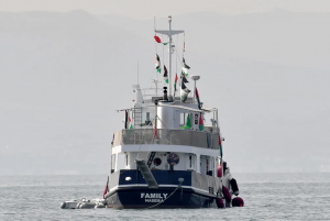 Gaza aid flotilla boats attacked by explosions and drones, activists say