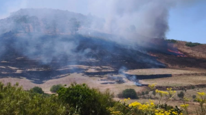 Fire blazes around Gozo's iconic Gelmus Hill