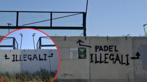 Activists spray paint the word 'illegal' on wall outside Manoel Island's illegal padel courts