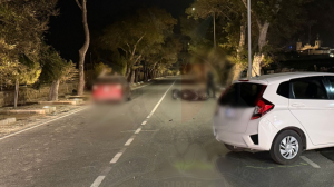 Motorcycle driver grievously hurt after collision involving two cars