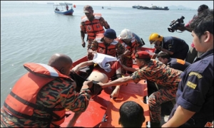 Dozens missing after boat sinks off Malaysia