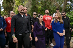 Thousands join president in charity walk for MCCF