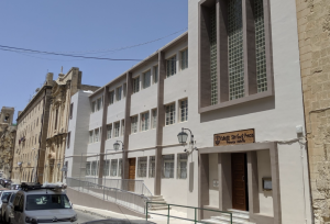 English-language charity stands by its record after ministry terminates services