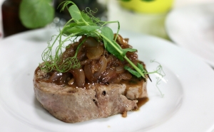 Veal ribeye with caramelised onions
